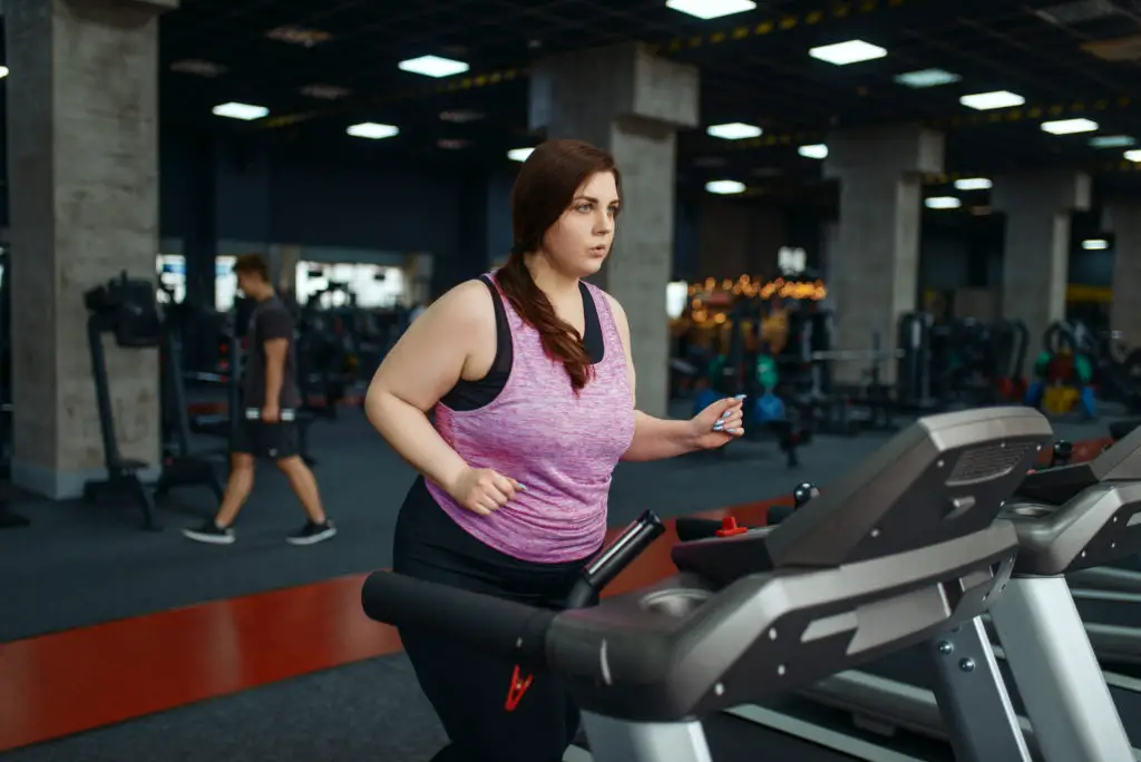 Overweight Woman on Treadmill