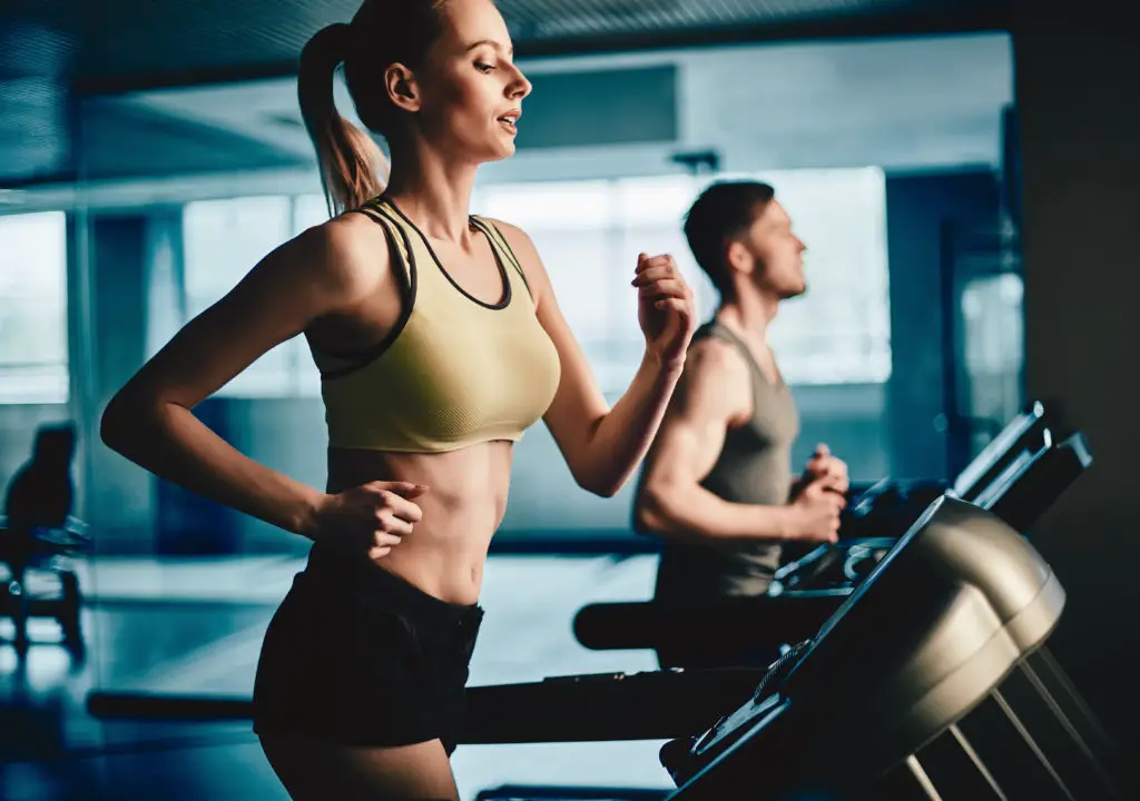 Woman Running on Treadmill