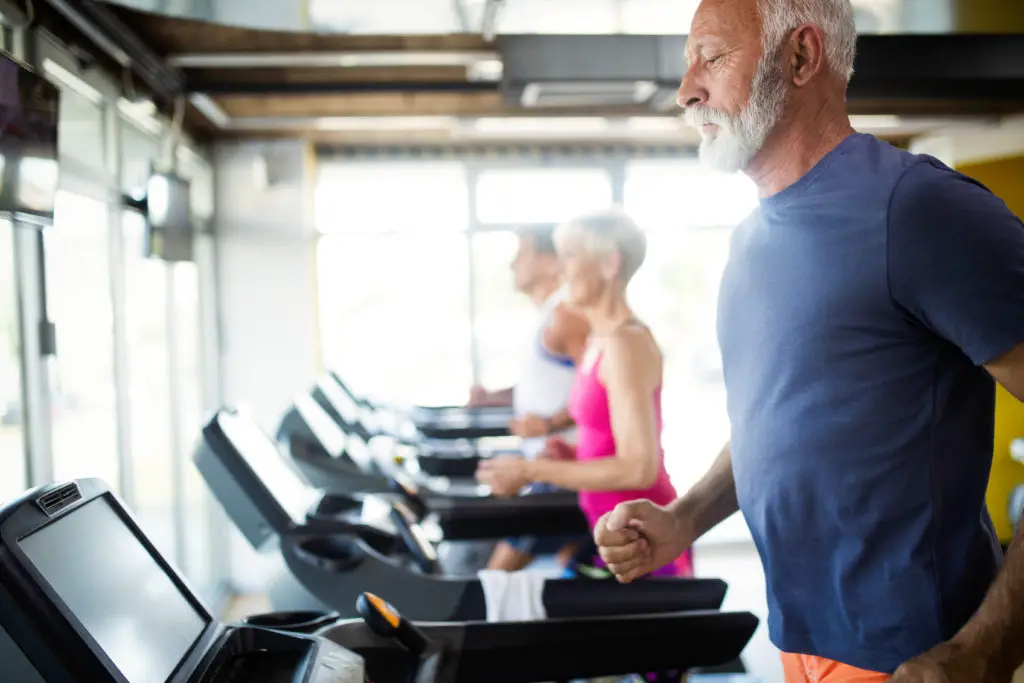 Senior People Running on Treadmill