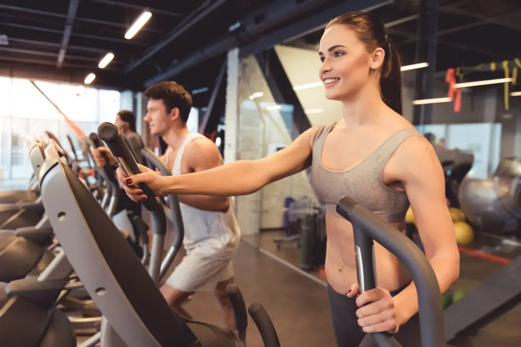 Woman Exercising on Elliptical