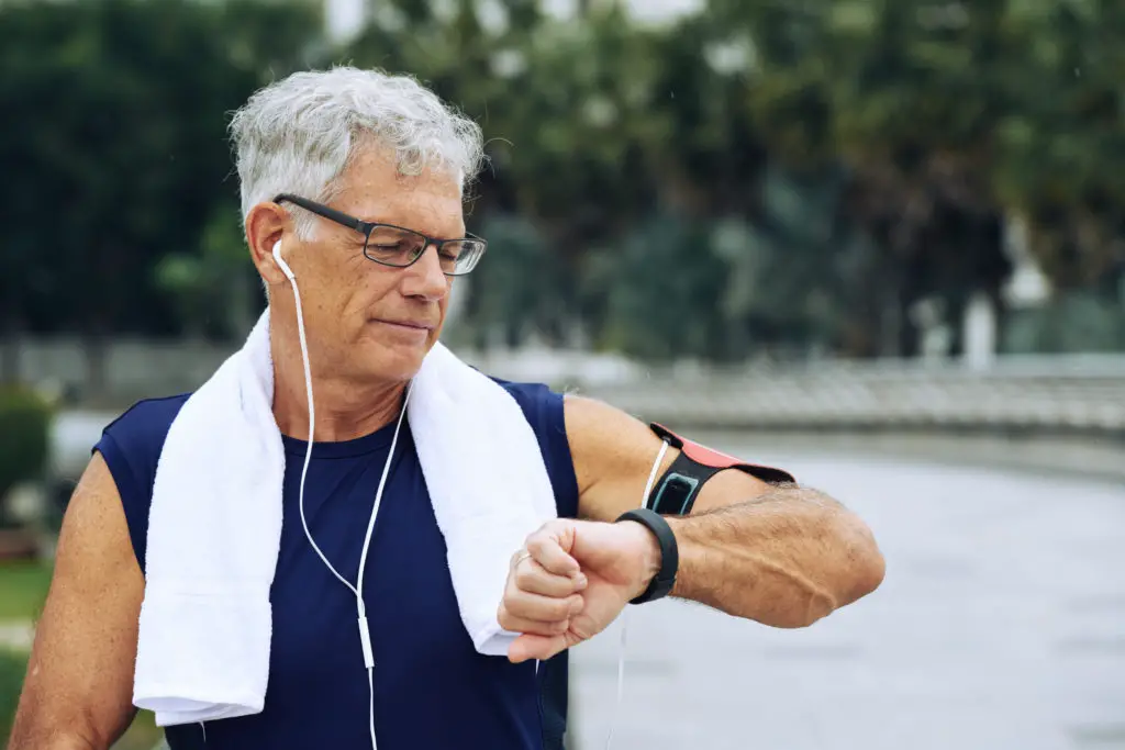 Old Man Checking Fitness Tracker