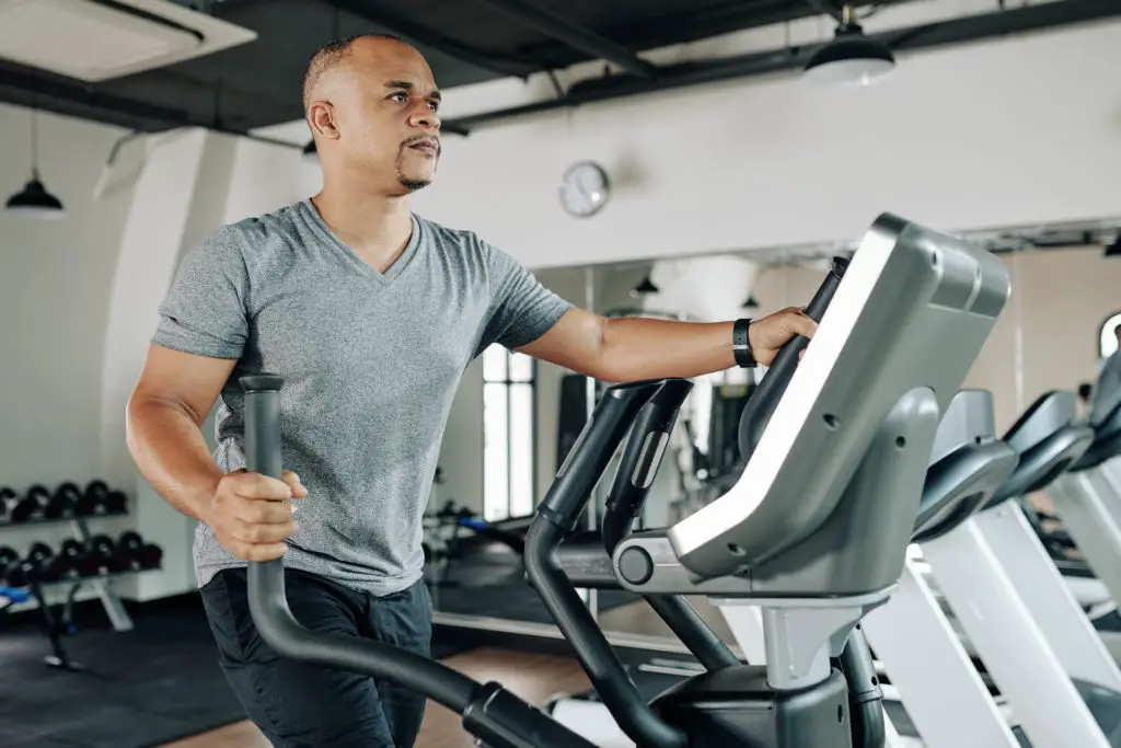 Man Working Out on Elliptical