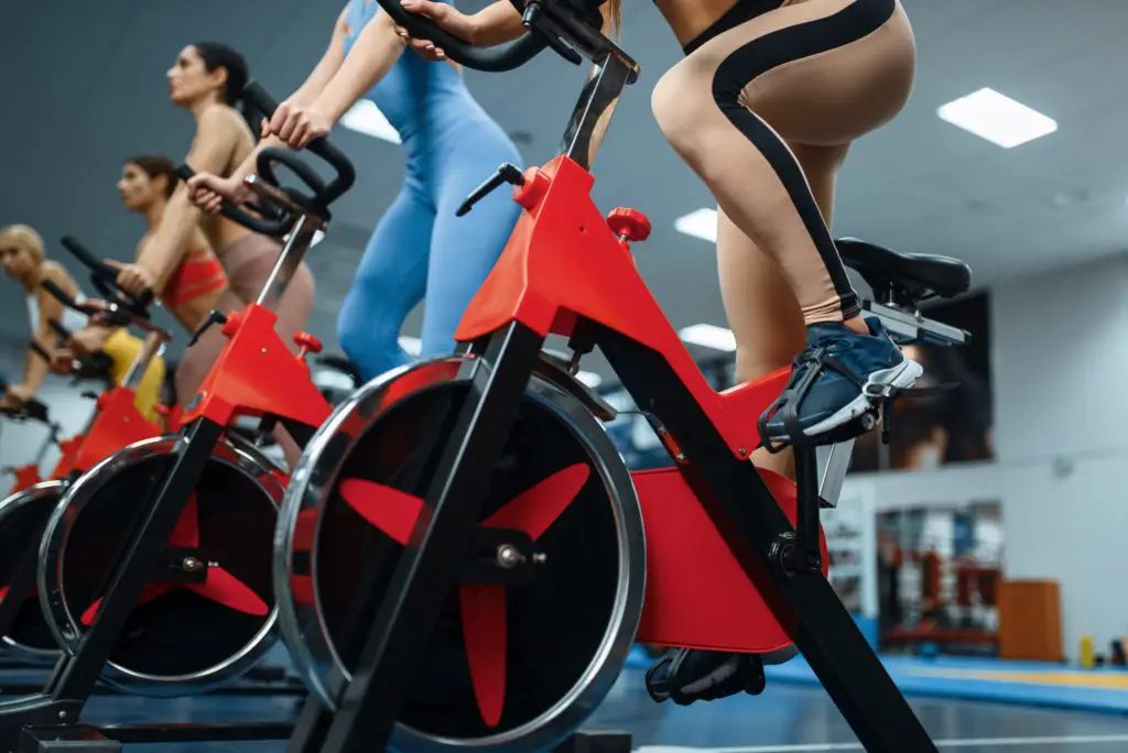 Women on stationary bikes